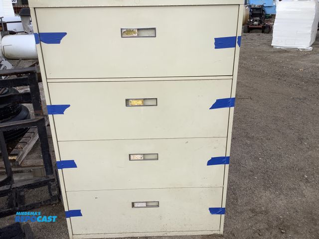 Lot 2-35986 - 5 shelf filing cabinet with approximate measurements of 52.5 x 18 x 36