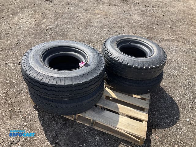 Lot 2-22324 - (4) 8-14.5 tires on steel mobile home style wheels, used
