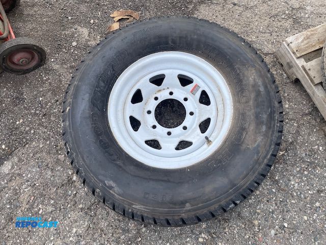 Lot 2-50084 - 1 Unused trailer spare tire on 8 lug wheel. Goodyear Wrangler HT, LT 235/85 R16