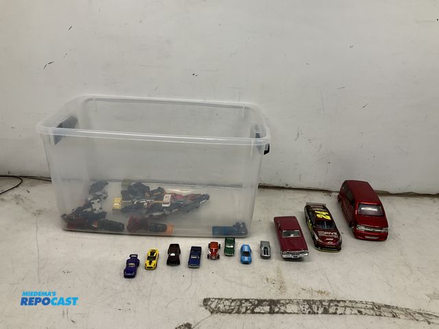 Lot 2-74260 - Tote of various toy cars including vans, trucks, limousine’s , and more