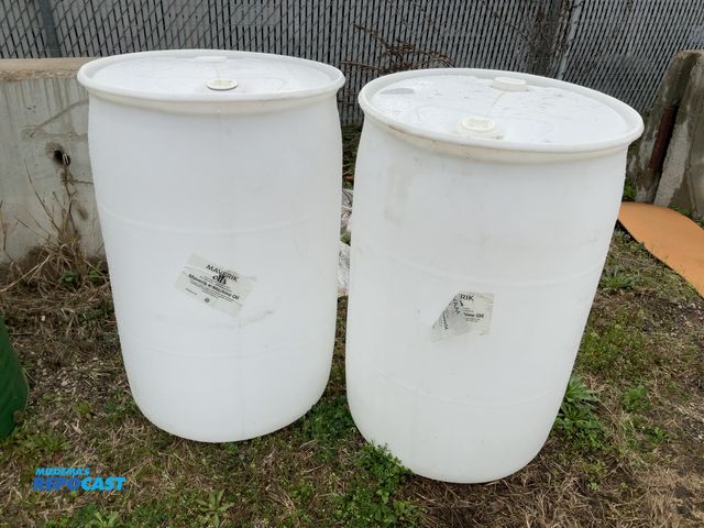 Lot 2-94817 - lot of 2 55 gallon white plastic barrels with 2 removable bungs, contained mineral oil