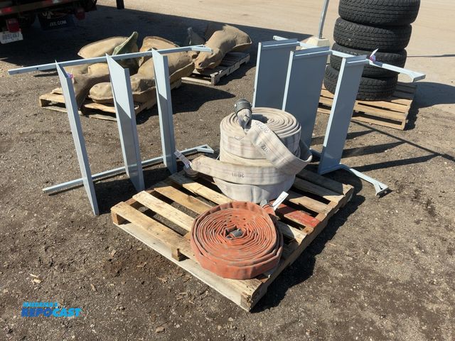 Lot 2-23356 - Lot of (4) Used Fire Hoses, all have holes, and (2) Metal 3-tier shelves, bases have to be bolted do...