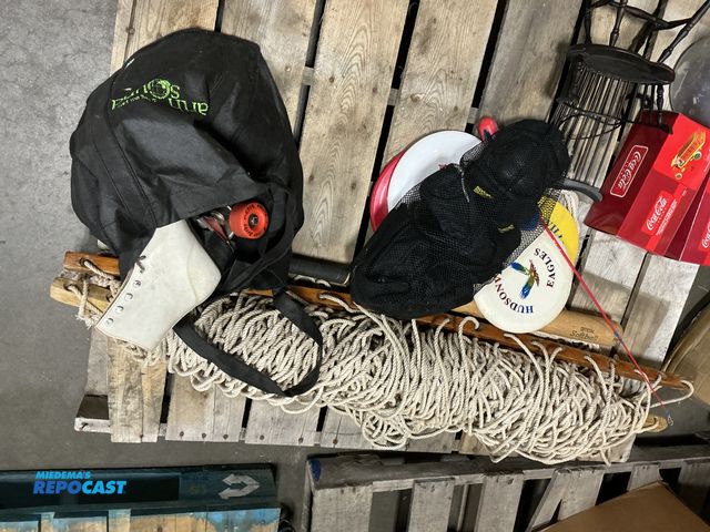 Lot 2-10123 - Miscellaneous lot of items including frisbees wooden bat mini fishing pole rollerblades knee pads an...