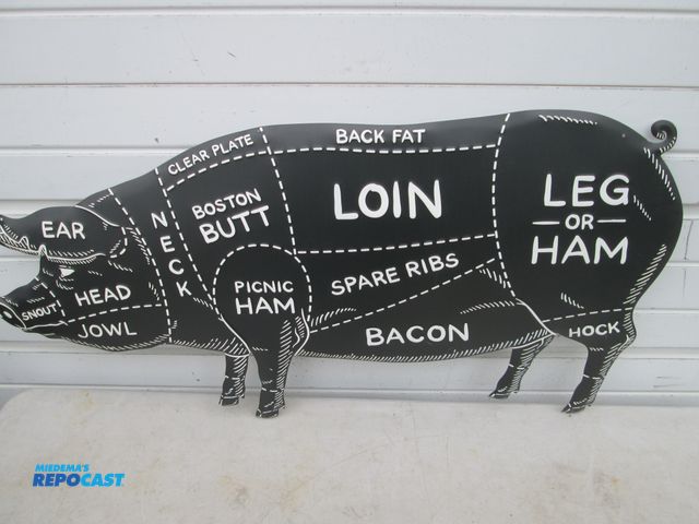 Lot 2-56881 - Large pig/pork meat cuts die cast embossed sign, 38" x 19"