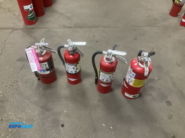 Lot 2-22052 - (4) 5 lb dry chemical fire extinguishers, two were last inspected in 2026 and two are unknown when l...