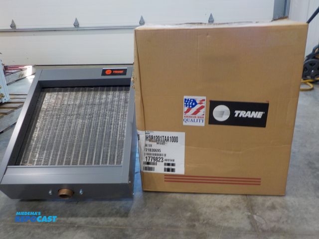Lot 2-30295 - New Trane steam/hot water unit heater with baffles. 115 volt. Single phase. 1/3 HP. See pics for uni...