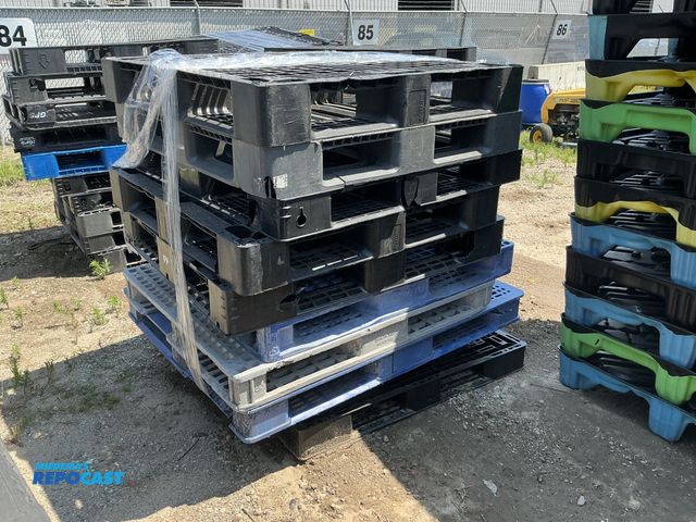 Lot 2-28658 - Stack of (10) blue, white, and black plastic stackable skids approx 43” x 43” x 5” - various conditi...