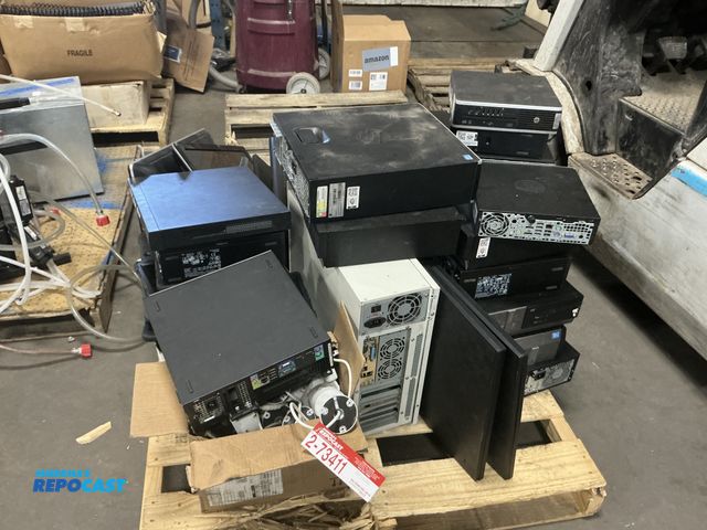 Lot 2-73411 - . . . Pallet of miscellaneous electronic items including pc boxes, dvd players, pc monitors, Honeywe...
