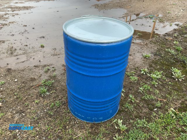 Lot 2-94814 - 1 55 gallon blue steel barrel with removable lid and locking ring, contained fruit juice