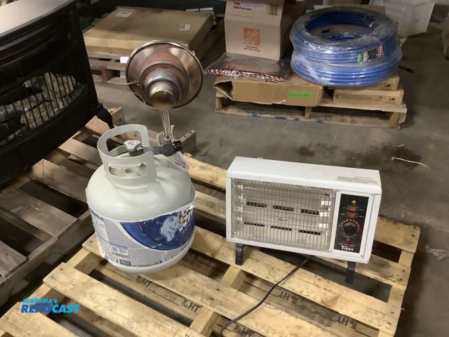 Lot 2-34766 - Instant heat titan heater, and a blue rhino 15LB propane tank with a heater attachment