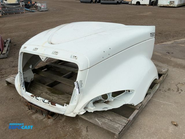 Lot 2-11767 - Used International Pro Star Semi Hood, Chunk of Fiberglass Broke Off/Missing by drivers side headlig...