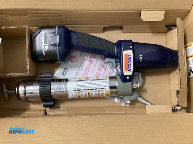 Lot 2-67335 - New Lincoln 18 Volt PowerLuber grease gun. Model 1800