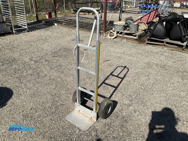 Lot 2-67888 - Dolly with approximately a 8.25x14” platform and measures approximately 52” tall