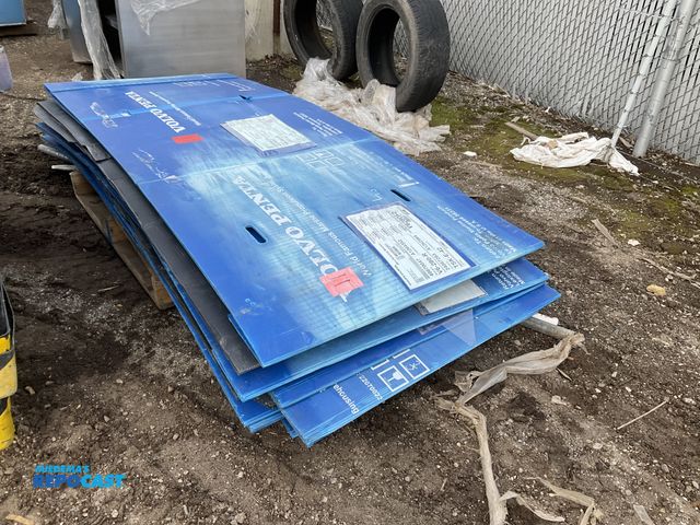 Lot 2-19854 - Skid lot of foldable black and blue  warehouse Volvo penta storage units