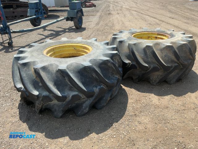 Lot 2-20988 - (2) Used Firestone Size 28L-26 Tires on Steel 8 Lug Wheels, approx. 8-5/8” center hole