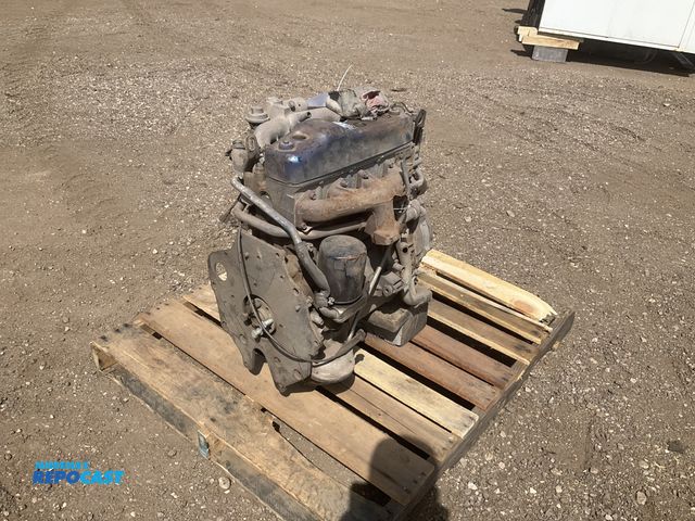 Lot 2-22983 - Isuzu 4-cylinder diesel engine, model/size unknown, missing some parts, working condition unknown