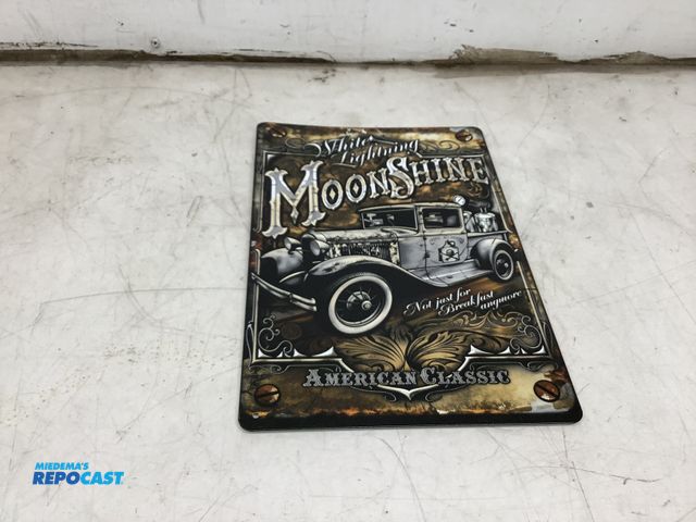 Lot 2-76353 - Moonshine metal tin sign approx. 8”x12”