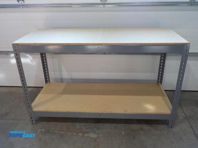 Lot 2-34137 - Metal frame two shelf storage rack. Wood shelves. Adjustable. 60" w x 24" d x 36" h