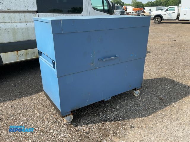 Lot 2-44525 - Knaack Job Box on Casters, handles on both ends, has two shelves, 60-1/2”x30-1/2”x54-1/2” tall