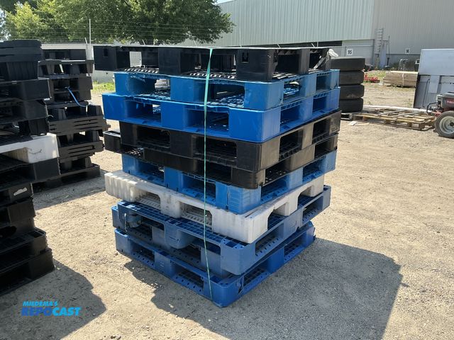 Lot 2-28656 - Stack of (10) blue, white, and black plastic stackable skids approx 43” x 43” x 5” - various conditi...