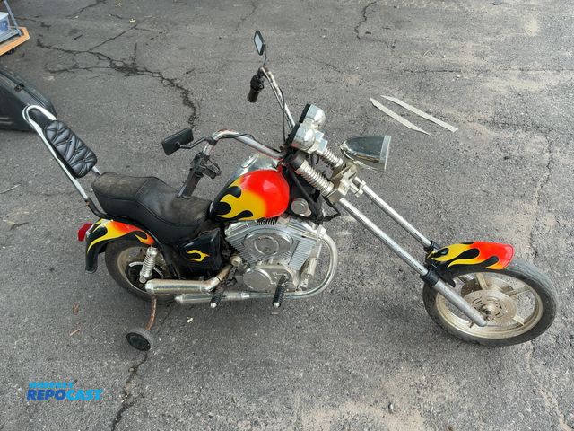 Lot 2-18254 - Non running children’s motorcycle toy with training wheels