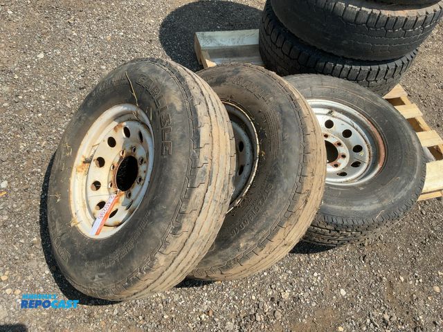 Lot 2-40296 - Lot of (2) Used 225/70D16 Trailer Tires on 8-lug Steel Wheels, and (1) Used 235/80R16 Trailer Tire o...