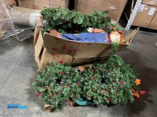 Lot 2-69668 - Skid of holiday decor. Includes wreaths, tree-like garland, a scarecrow, Christmas tree, etc.