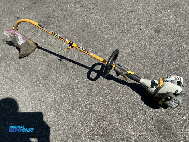 Lot 2-76740 - used ryobi gas weed wacker with extra parts 50/1