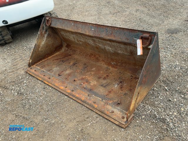Lot 2-44131 - Used CAT 74" Skid Steer Bucket, bolt on metal cutting edge, has rust holes in bottom