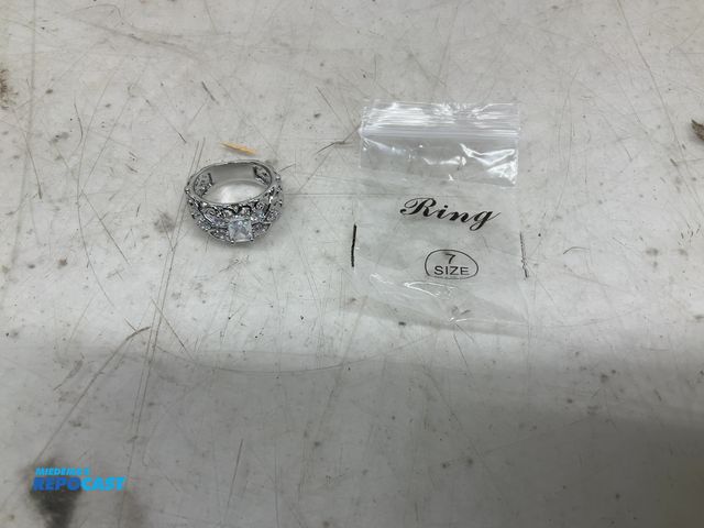 Lot 2-10046 - Cubic cocktail ring with a silver setting and clear stones size 7