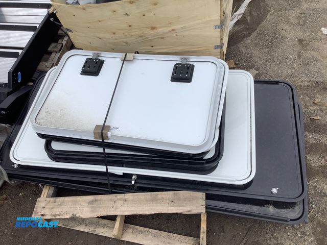 Lot 2-93679 - Skid with asst. Cargo Doors