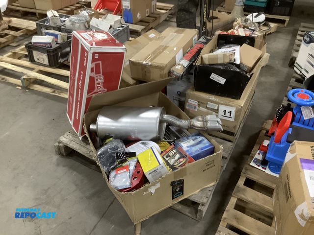 Lot 2-19674 - automotive car part lot- coils, Carhart seat covers, and more