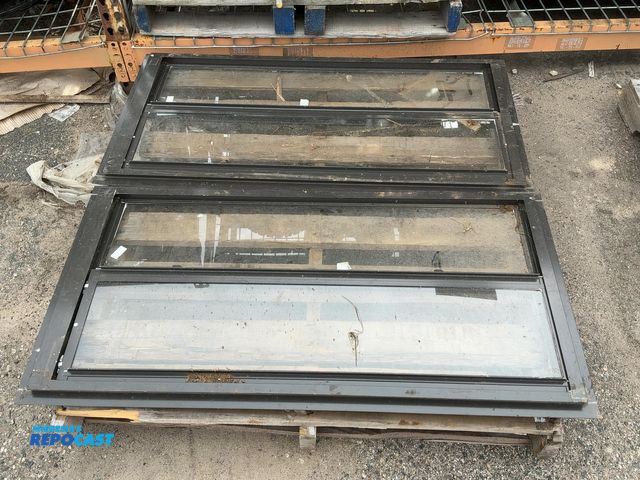 Lot 2-27250 - (2) Aluminum frame single pane slide windows. Rough opening. 22” x 43”.