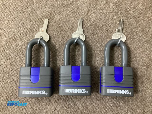 Lot 2-94615 - New Three new Keyed Alike Brinks padlocks. BRINKS 40MM weather resistant padlocks. Rubber coated loc...