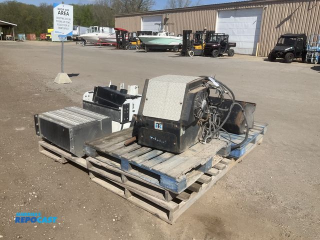 Lot 2-11741 - Skid of misc truck parts including a Thermo King APU for parts/repair, aluminum battery step box, st...