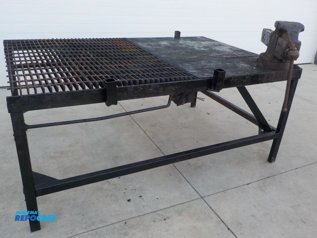 Lot 2-34199 - Large welding table with 6" industrial vise. 73" w x 49"d x 31"h. Vise needs washer welded on handle...
