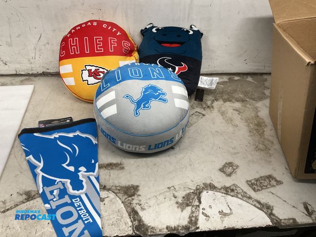 Lot 2-65696 - Lot of Assorted Pillows includes: Lions 15" Pillow, Kansas City pillow, Texans Mascot Pillow, Lions ...