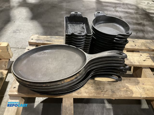 Lot 2-55073 - Lot of cast iron cookware includes (8) Lodge 9” oval skillets with handle, (10)  Lodge 5.5” x 4” loa...