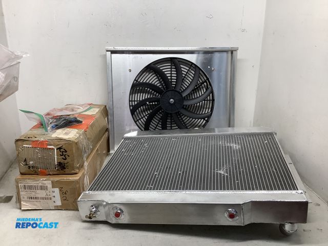 Lot 2-35394 - Car parts including a 12V KKS radiator cooling fan, a all aluminum performance radiator, replacement...