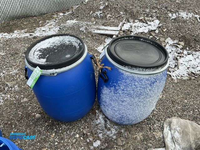 Lot 2-63388 - Lot of (2) 25gal. blue plastic barrels w/ removeable lid and locking rings - Clean inside