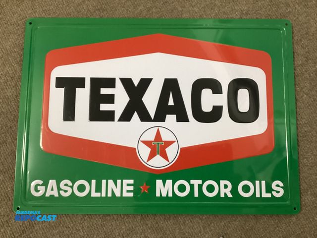 Lot 2-77641 - New metal TEXACO gasoline/ Motor Oil sign. Holes in each corner for hanging. Measures 17” X 12”