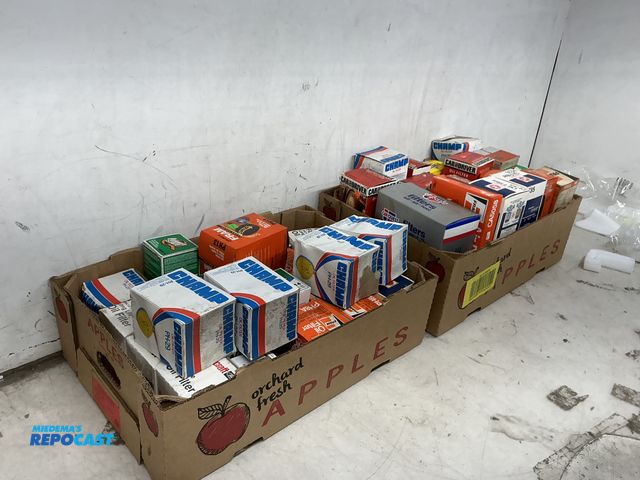 Lot 2-36945 - two boxes of new oil filters. champ, motorcraft, AC, fram, quaker state, others