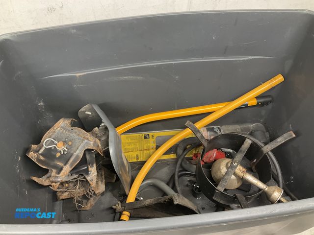 Lot 2-27534 - Bin of a propane stove and gardening tools