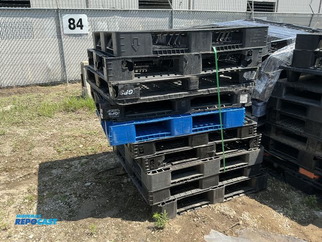 Lot 2-28659 - Stack of (10) blue and black plastic stackable skids approx 43” x 43” x 5” - various conditions