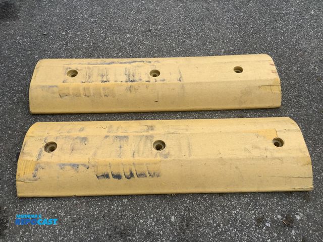 Lot 2-27927 - Lot of (2) plastic speed bumps, 31"x9"x2.25", used condition