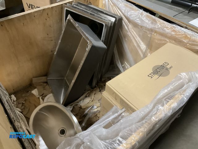 Lot 2-33259 - Crate of faucets and sinks 5 rectangular sinks 3 oval sinks and 10 rv faucets