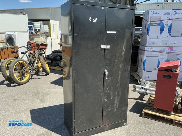 Lot 2-62396 - One black Uline cabinet locker measuring 36" x 18" x 72".