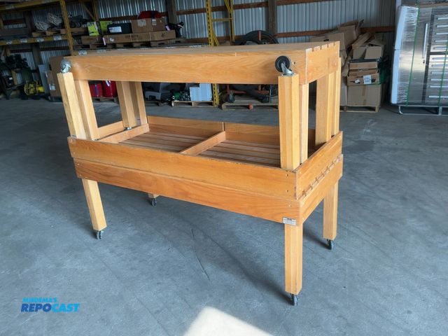 Lot 2-21247 - (3) Used CMS Wood Merchandising Tables on Casters, one is 6'x20"x28" tall and two are 6'x30"x28" tal...