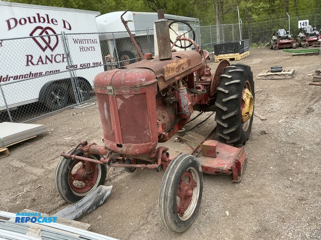 Lot 2-15404 - Farmall Model A tractor with a five feet wide International belly mower, in original condition .Adju...