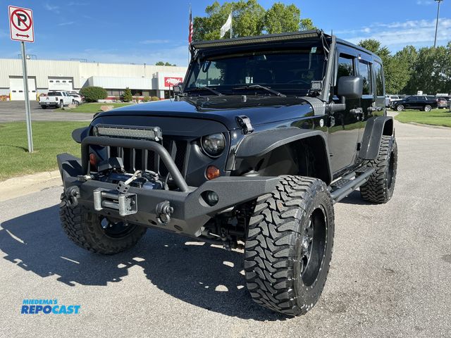 Lot 2-31414 - 2013 Jeep Wrangler Unlimited Sahara 4WD SUV